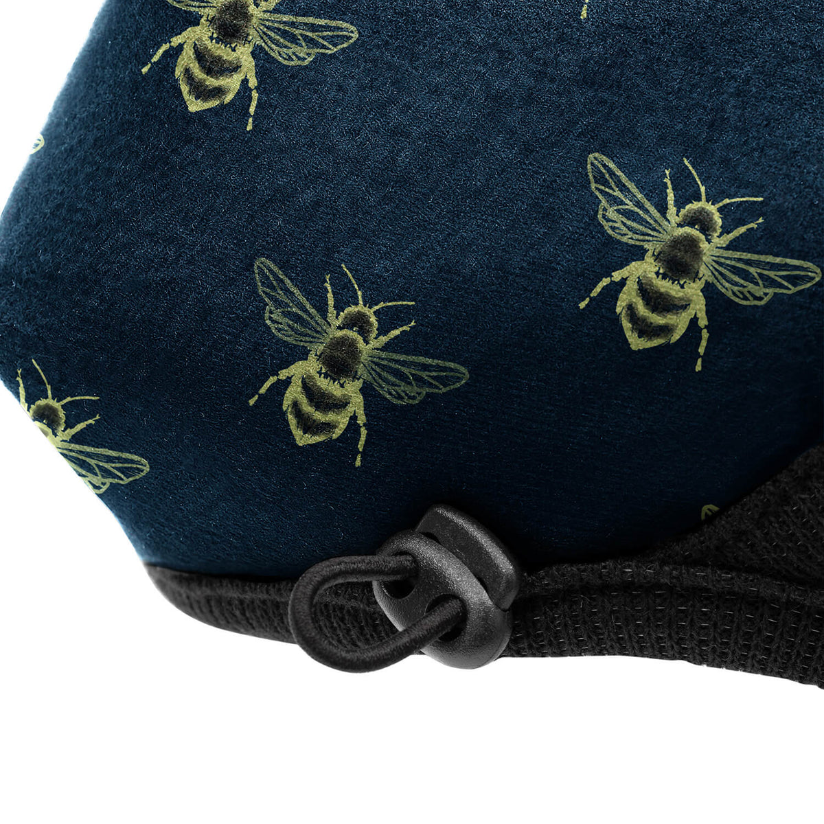 Close up image of the Toggle on The Burt Non Valve Face Mask